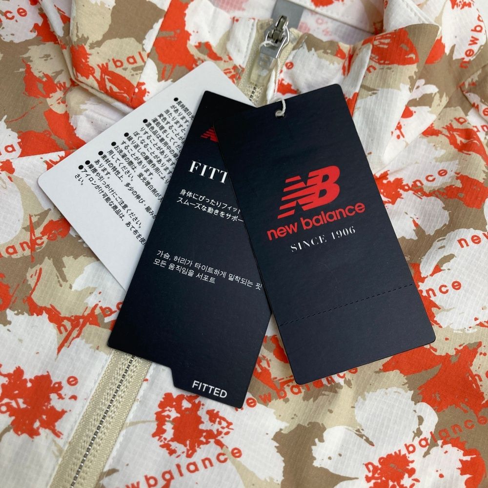 サイズ：0 NEW BALANCE GOLF ニューバランス  デザイン切替 フルジップベスト 総柄 オレンジ系 [240101717441] ゴルフウェア レディース ストスト サイズ：0 NEW BALANCE GOLF ニューバランス デザイン切替 フルジップ