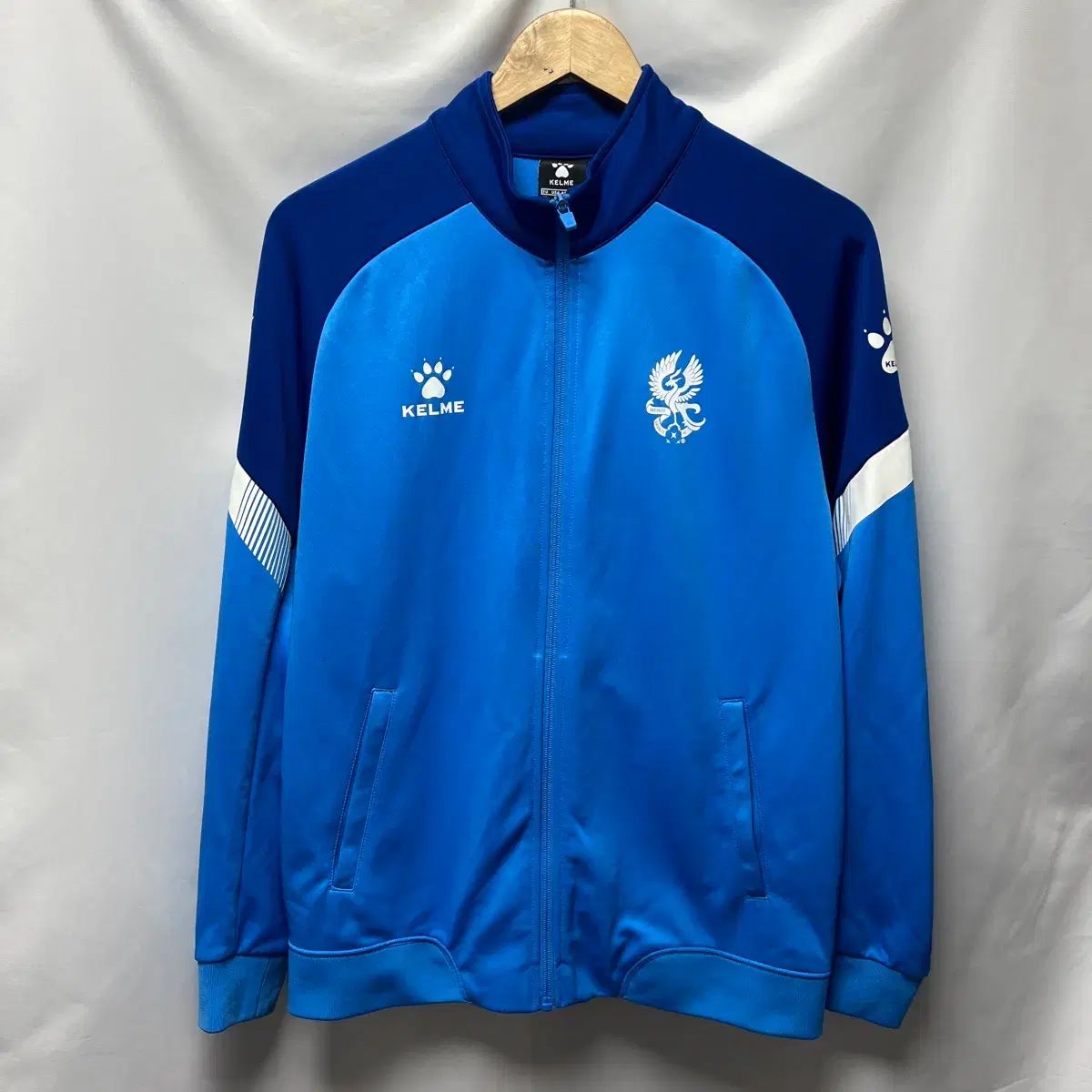 正規品/L KELME(ケルメ) 光州FC トレーナー スカイブルー ジップアップ ジャージ ジャケット