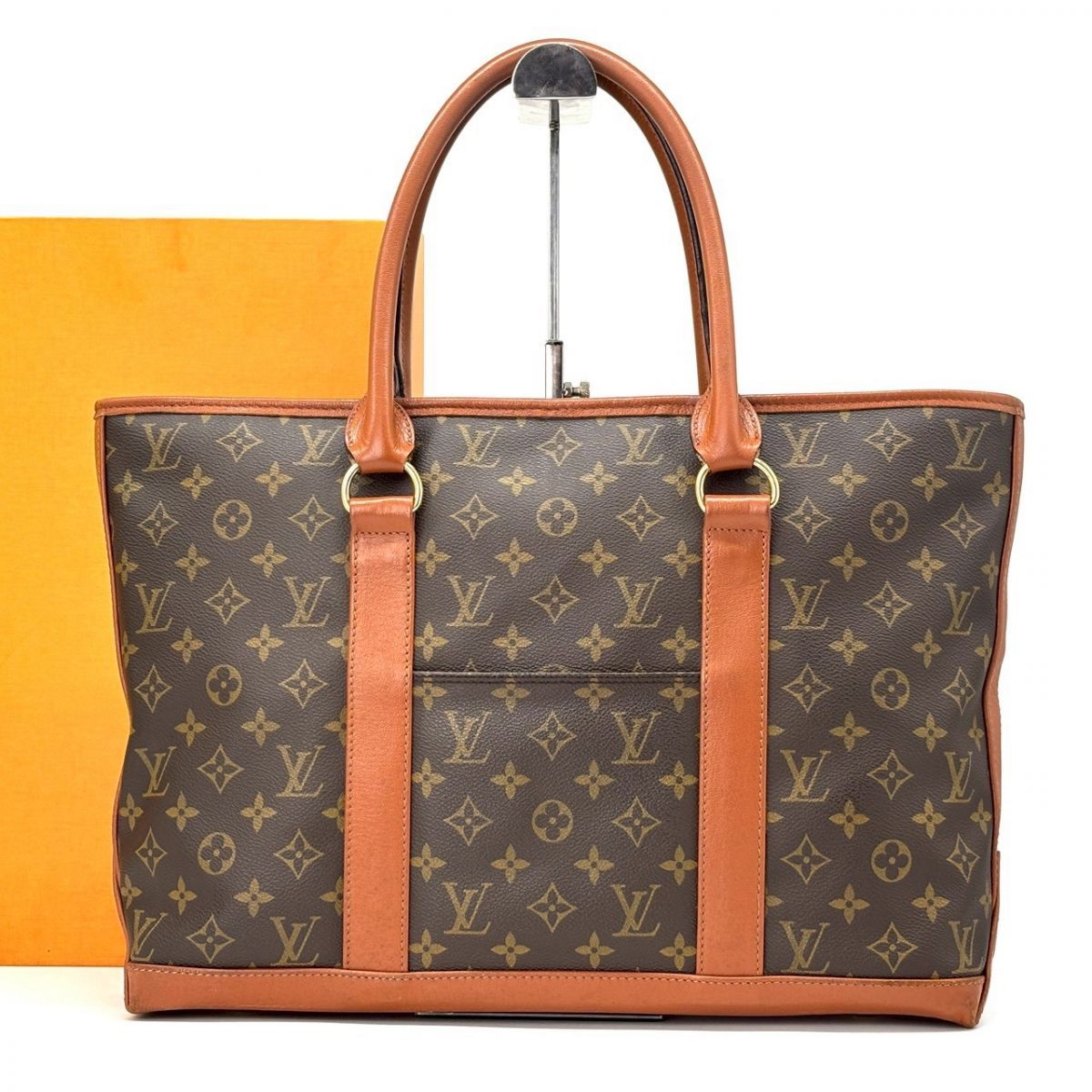 【余裕は革に刻まれる】　LOUIS VUITTON　トートバッグ モノグラム ウィークエンドPM A4収納可 レザー　ブラウン
