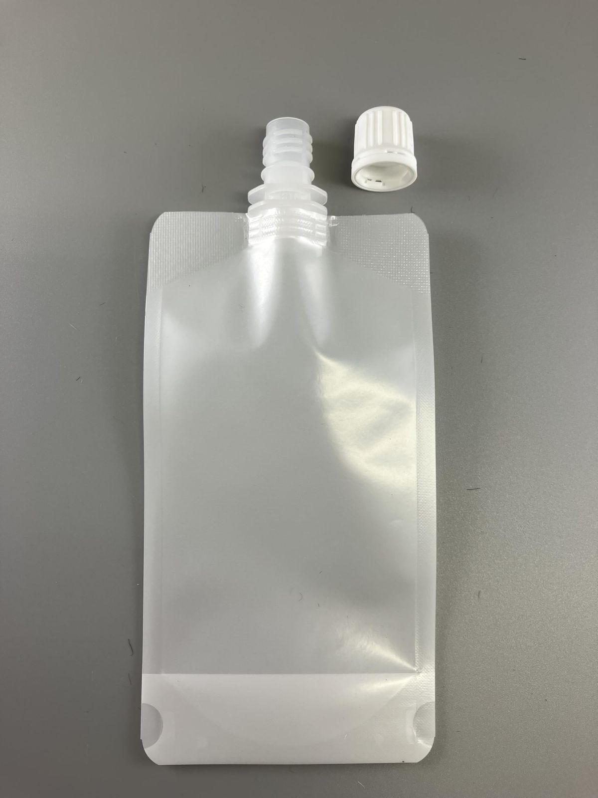 100ml 半透明 スパウトパウチ 【Duck100スリム】100枚入り スリム スタンドパウチ 詰め替えパウチ 食品用 化粧品用 旅行用 出張用 携帯用
