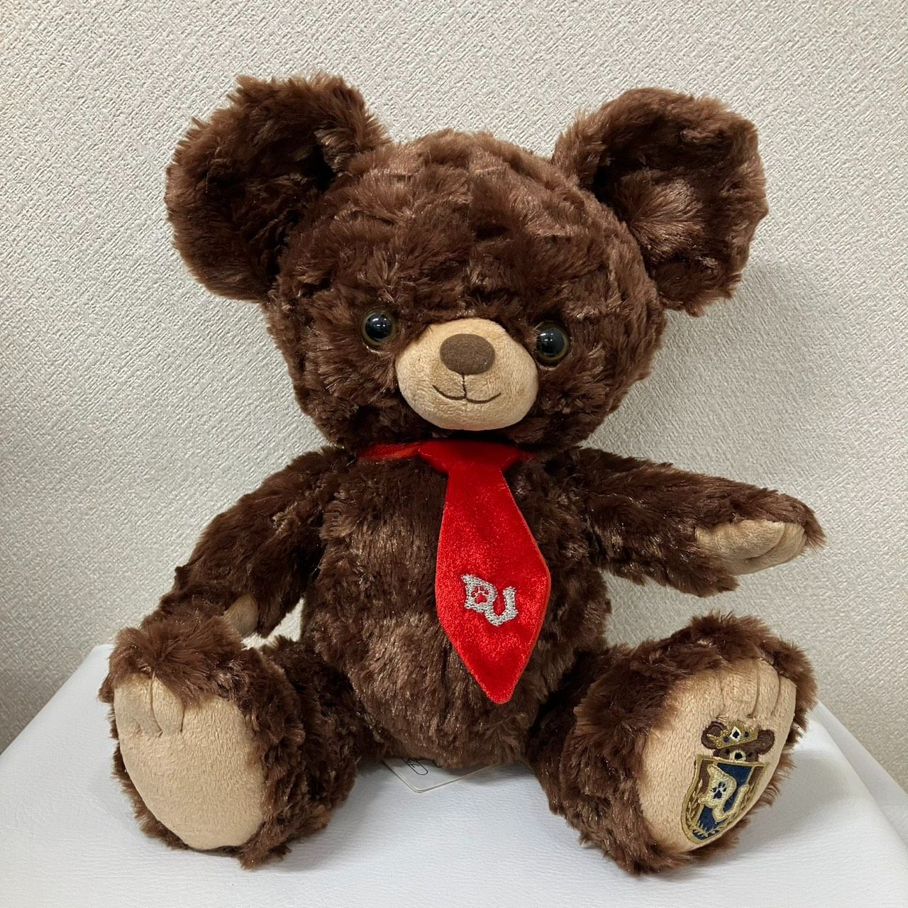 新品・タグ付き】ディズニーストア ユニベアシティ モカ ぬいぐるみ