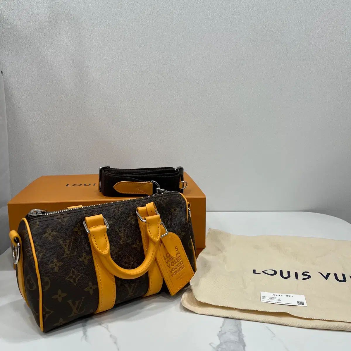 正規品 Louis Vuitton ルイヴィトン モノグラム バンドリエール キーポル 25 シャフラン イェロー