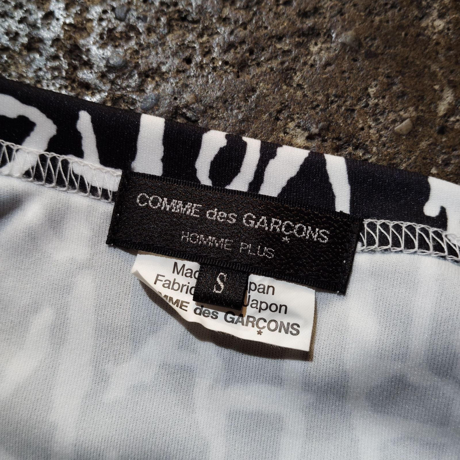 COMME des GARCONS HOMME PLUS 23aw Edward Goss 英字総柄穴あき