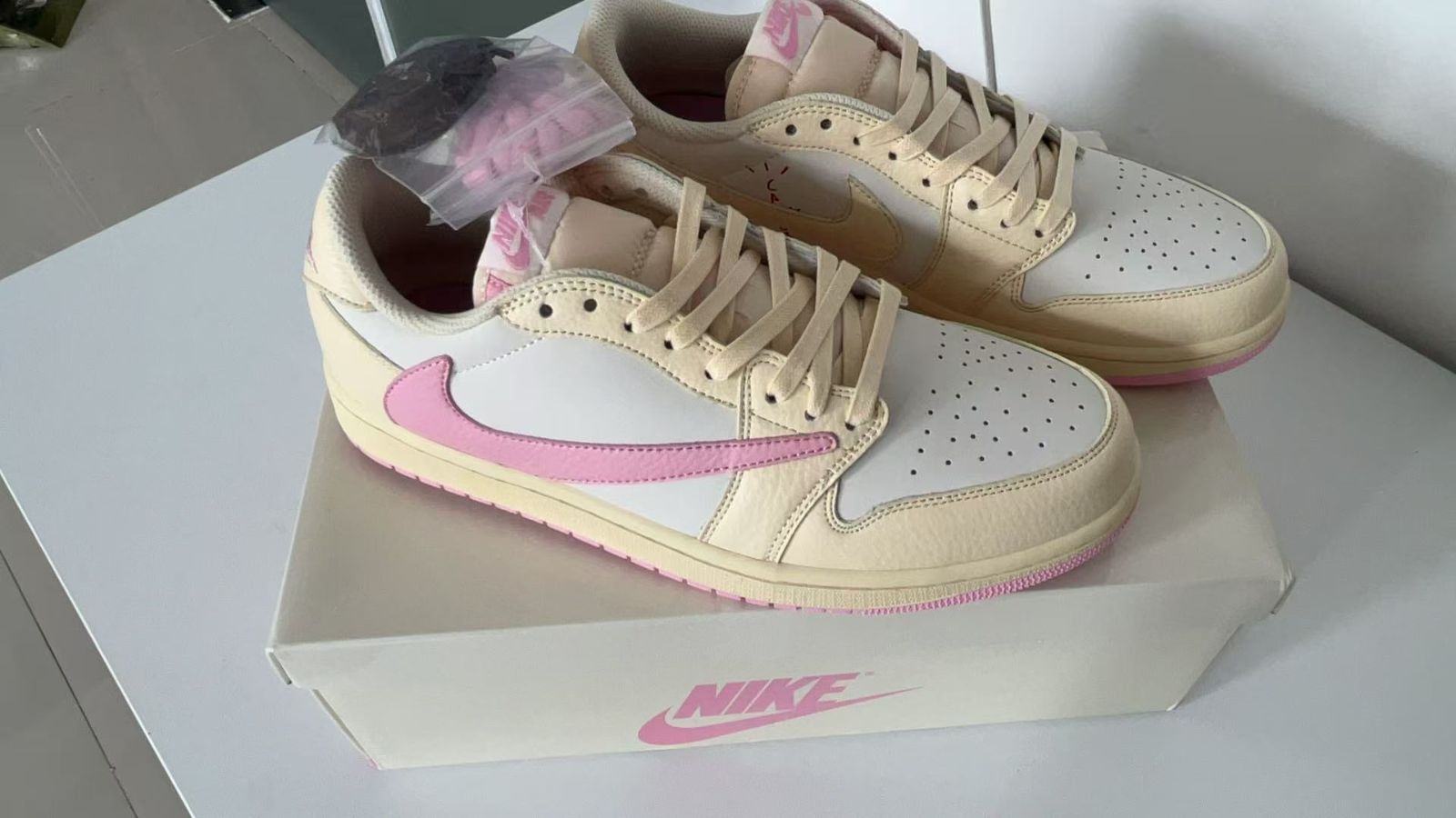 Travis Scott x Air Jordan 1 Retro Low OG “Shy Pink” & “Tropical 