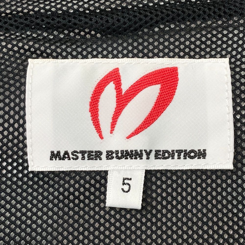 サイズ：5 MASTER BUNNY EDITION マスターバニーエディション ; フード付 ジップジャケット パーカー 総柄 ブラック系 [240101722834] ゴルフウェア メンズ ストスト