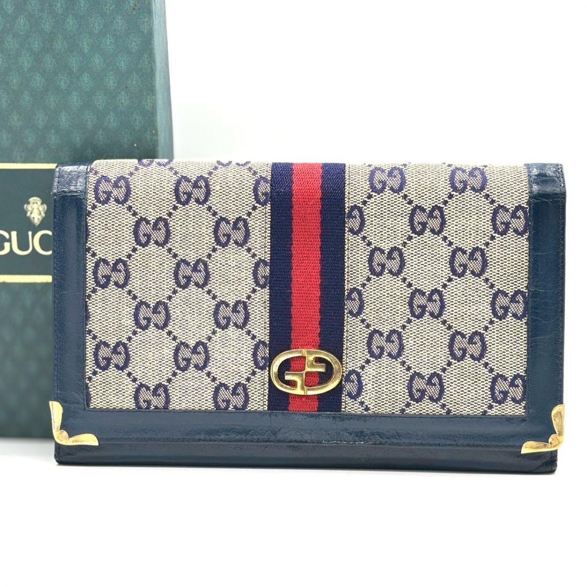 静かな誇りを纏う】 GUCCI 長財布 GGキャンバス シェリーライン 