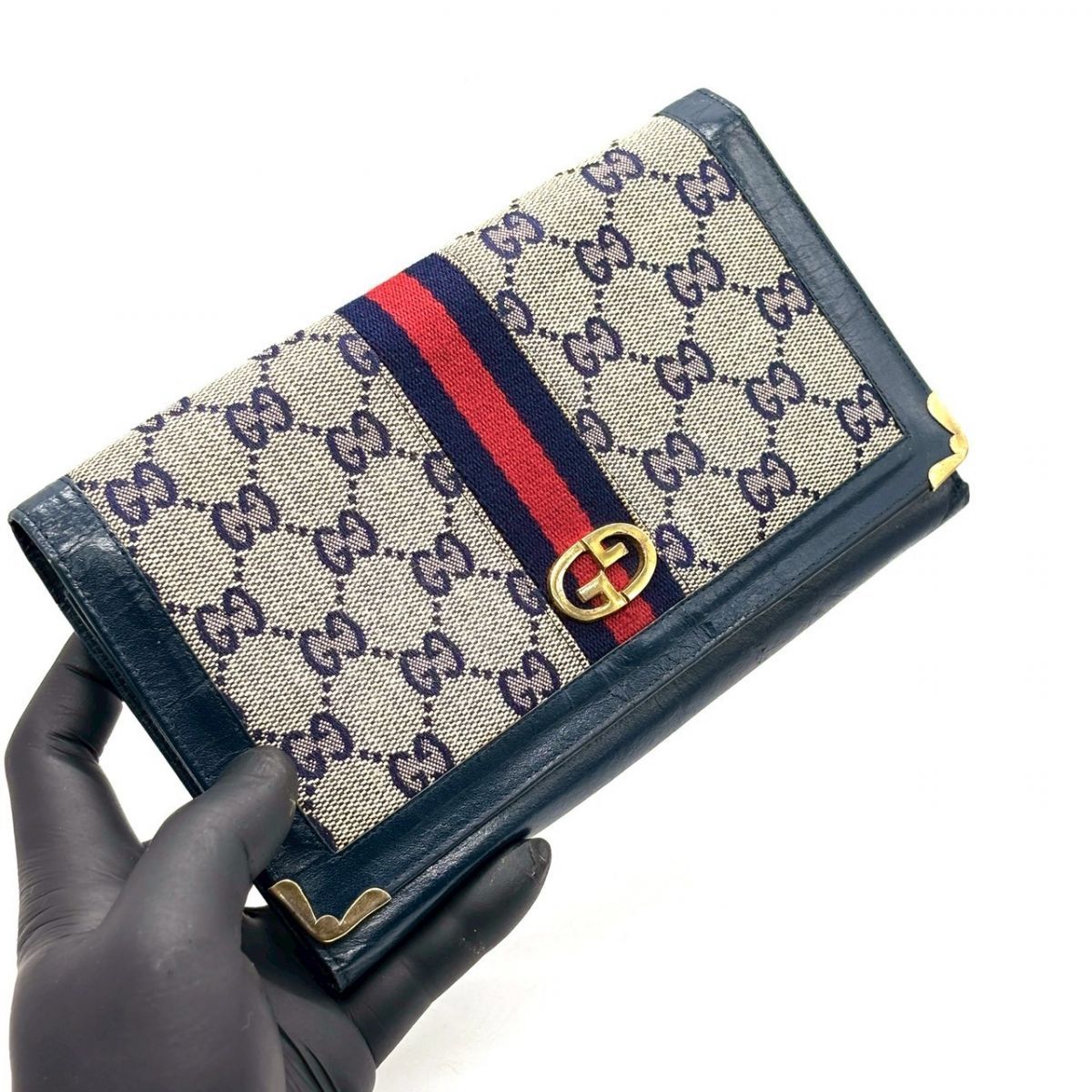 静かな誇りを纏う】 GUCCI 長財布 GGキャンバス シェリーライン 