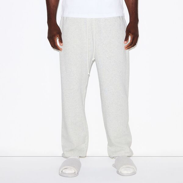スキムズ メンズ ボトムス カジュアルパンツ ジョガーパンツ フリース SKIMS Mens Fleece Lounge Relaxed Joggers Light Heather Grey グレー