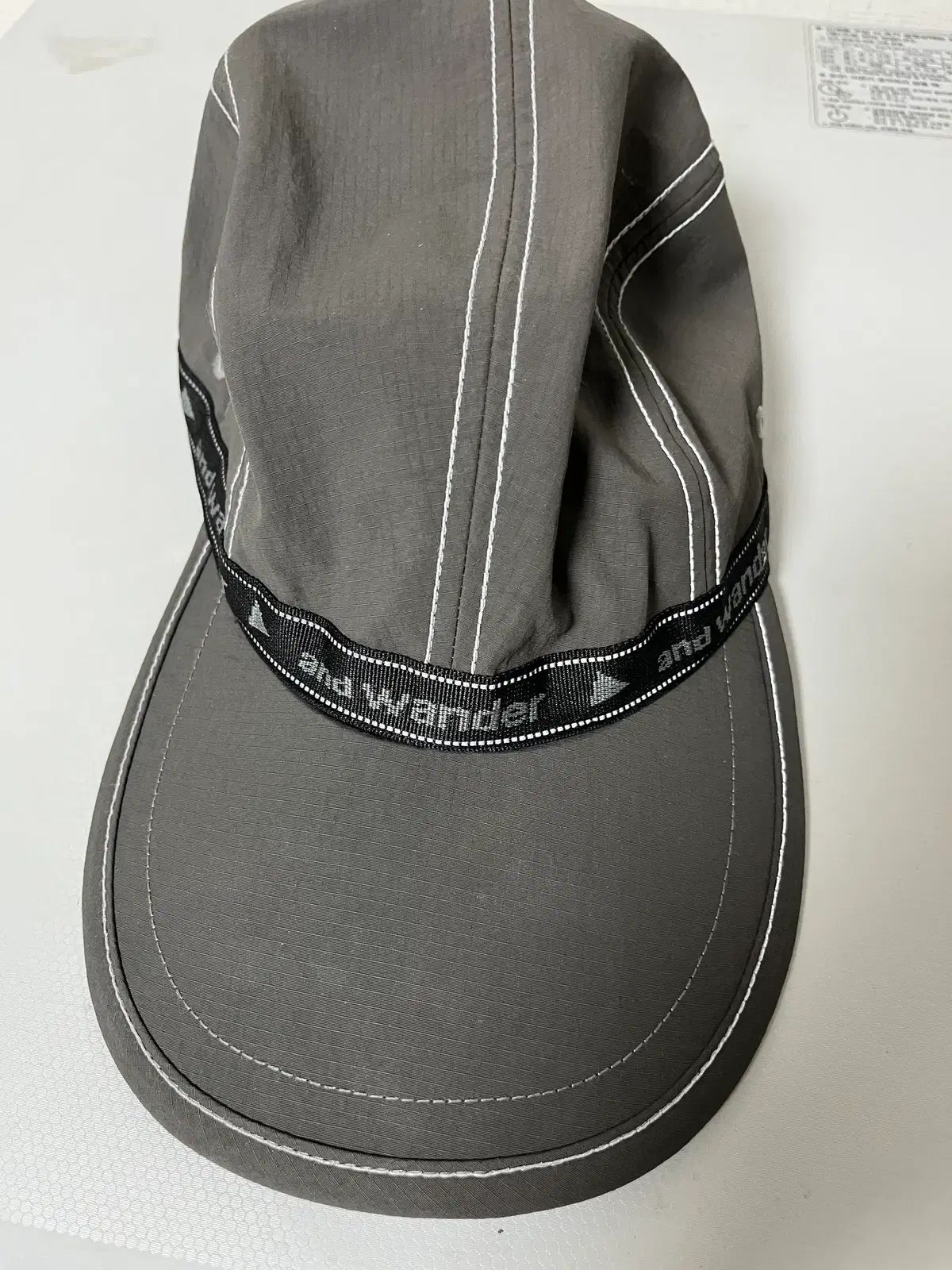 and wander JQ テープ キャップ BLACK
