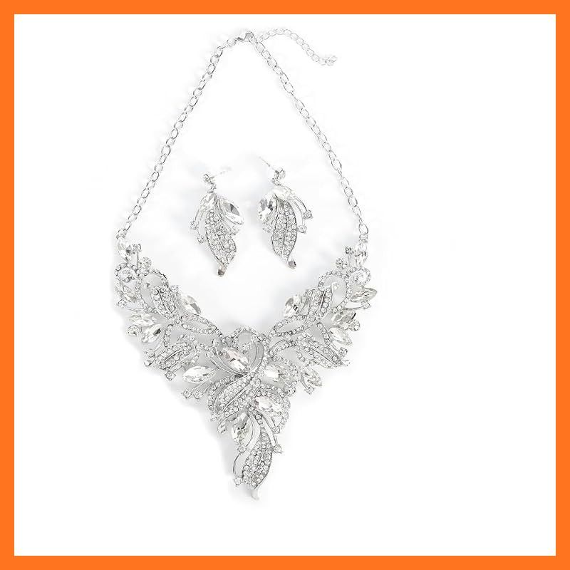 【新品】 [ＫＫ　Ｓｏｌｉｓ] [日本国内検品] ネックレス ピアス セットディスクキャッチ 結婚式 パーティー 演奏会 発表会 舞台 ナイトフォーマル 大ぶり 豪華 高見えPhoenix Plume Collection（クリアシルバー・ピアスセット)