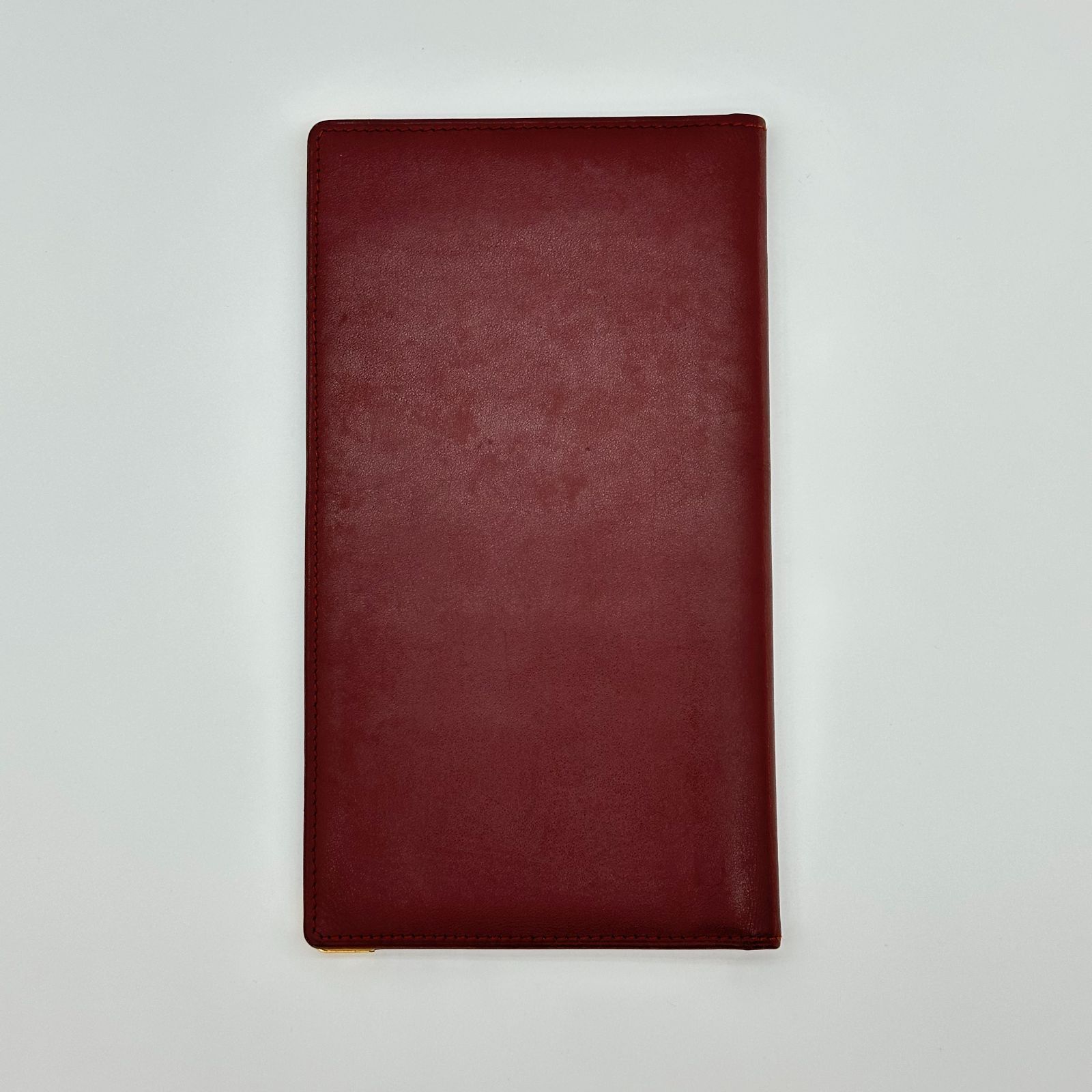 カルティエ Cartier マストライン 2C ロゴ ボルドーレザー 二つ折り長財布 札入れカード入れ付き レディース中古