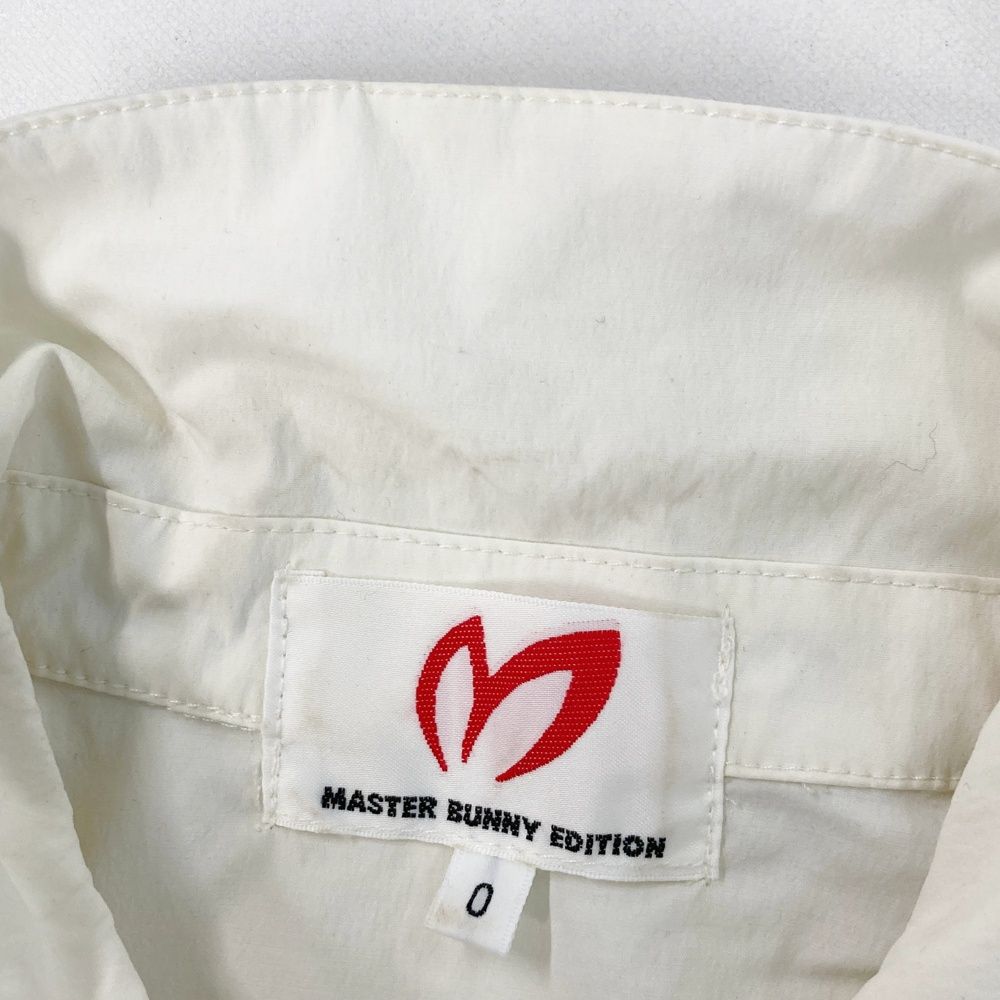 サイズ：0 MASTER BUNNY EDITION マスターバニーエディション 2025年モデル ハーフジップ半袖ジャケット  ホワイト系 [240101581044] ゴルフウェア レディース ストスト サイズ：0 MASTER BUNNY EDITION マスターバニーエディション 2025年