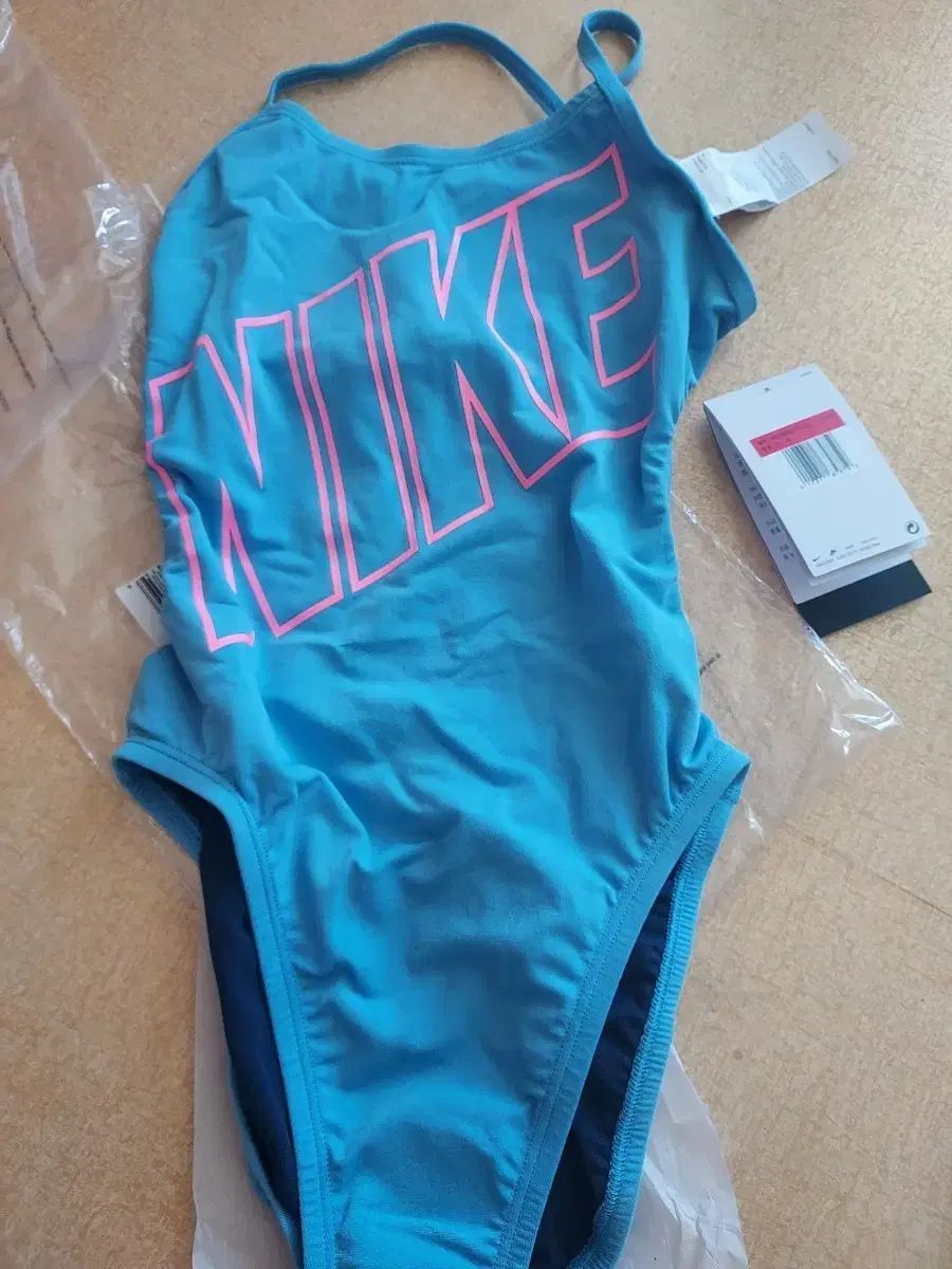ナイキ 水着 青 ピンク ロゴ 28