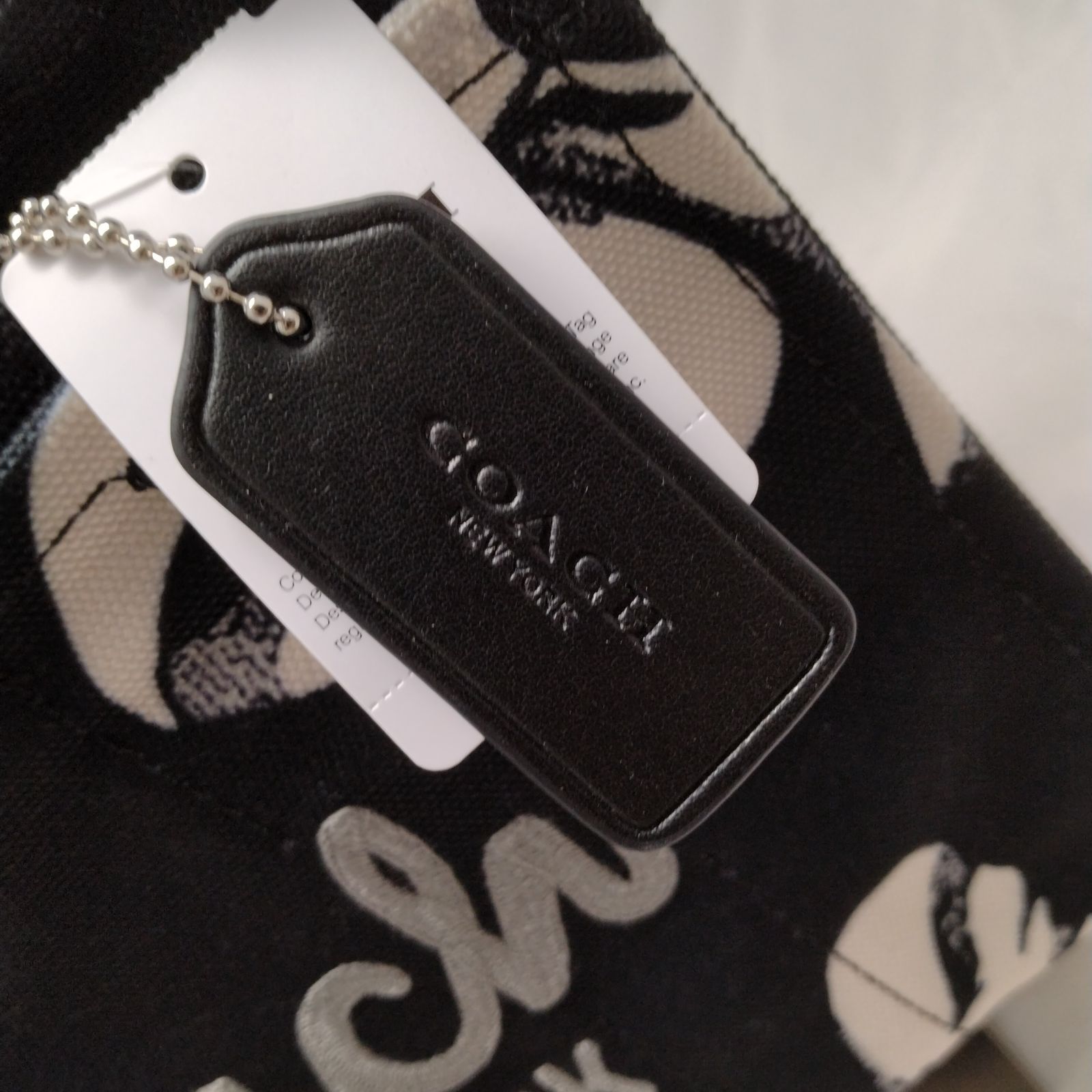 新品未使用】Coach ブラックカーゴトートバッグ リボン柄キャンバス26