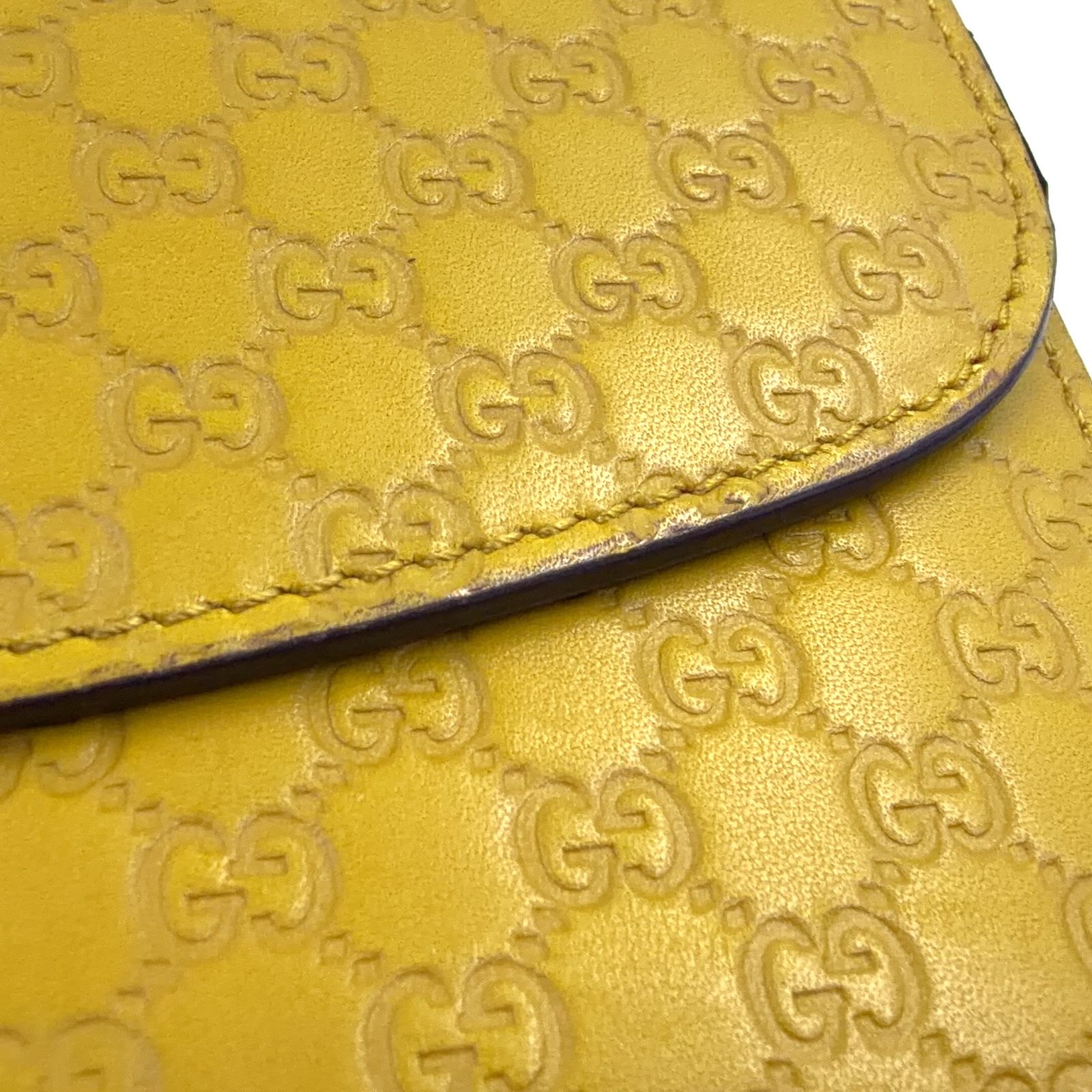 新着】GUCCI マイクログッチシマ レザー イエロー 三つ折り長財布