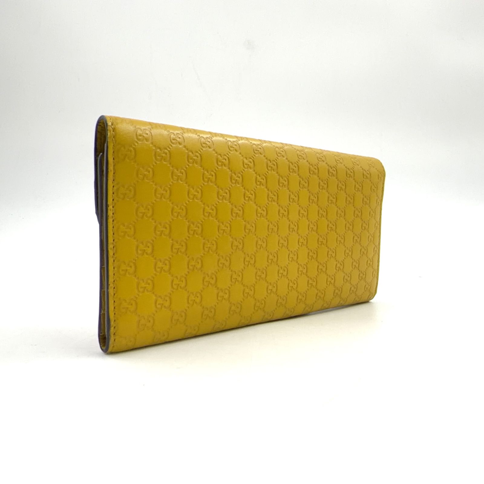 新着】GUCCI マイクログッチシマ レザー イエロー 三つ折り長財布