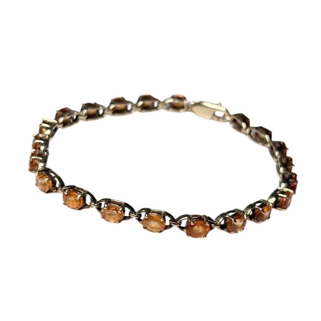 vintage 9ct gold tennis bracelet set with orange sapphire