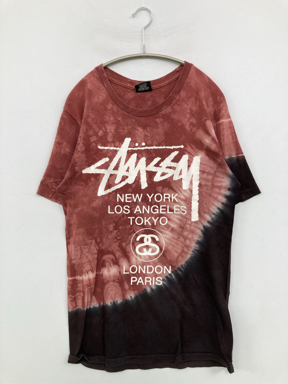 stussy ステューシー Tシャツ/カットソー S ブラウン 前面プリント バックプリント ミドル丈 その他総柄 半袖 クルーネック(丸首) メンズ