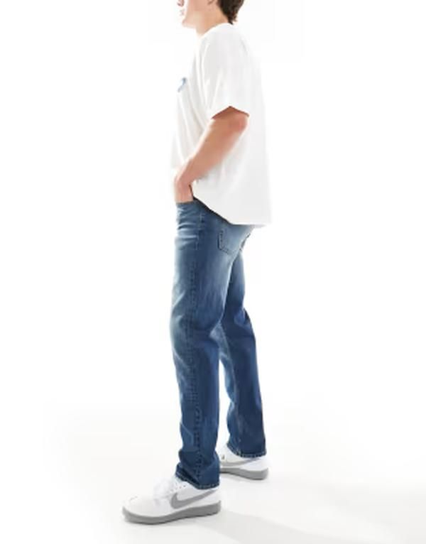 エイソス メンズ ボトムス デニムパンツ ジーンズ ASOS DESIGN slim jeans in mid wash Mid wash blue ブルー