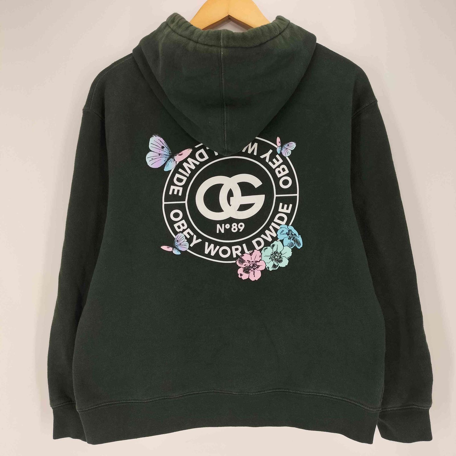 オベイ OBEY ロゴプリント 蝶々 花 プルオーバーパーカー メンズ 