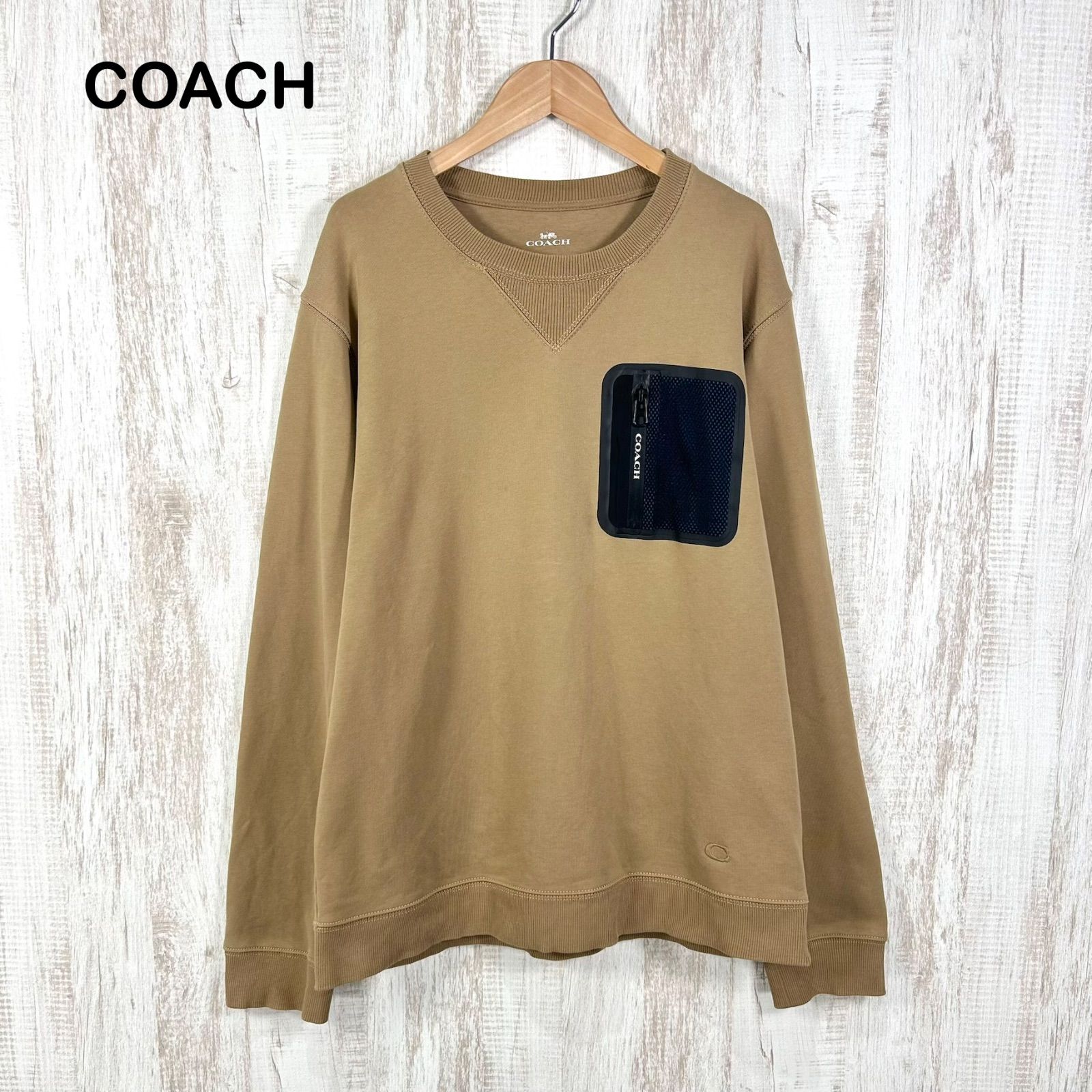 COACH コーチ ロゴ総柄 ワンポイントポケット スウェット ベージュ