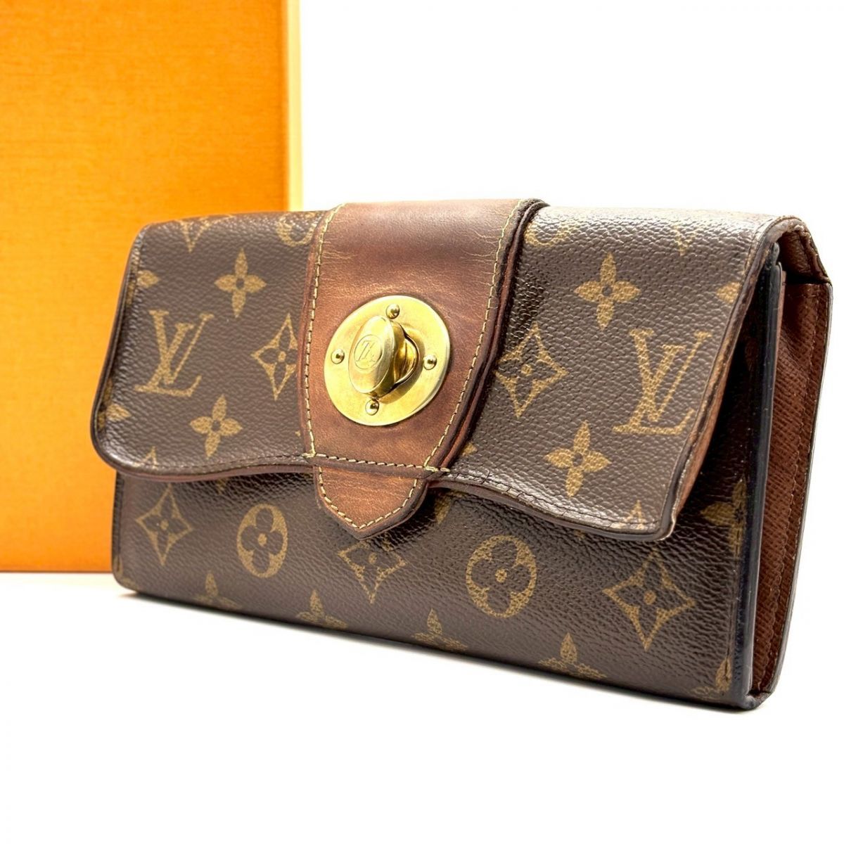 【時を重ねた艶を纏う】　LOUIS VUITTON　長財布 モノグラム ポルトフォイユ ボエシ ターンロック ヌメ革 ゴールド金具 16カード　ブラウン｜長財布