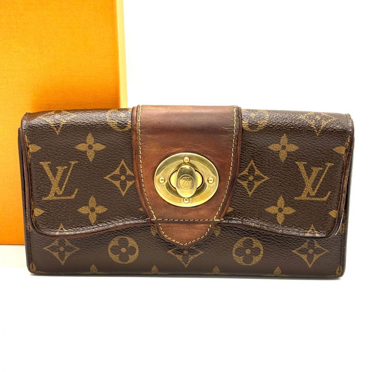 【時を重ねた艶を纏う】　LOUIS VUITTON　長財布 モノグラム ポルトフォイユ ボエシ ターンロック ヌメ革 ゴールド金具 16カード　ブラウン｜長財布