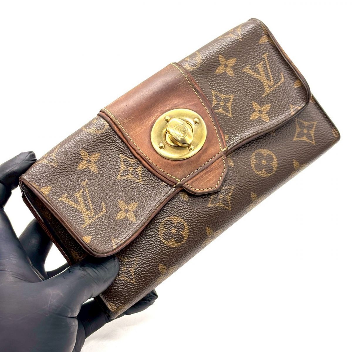 【時を重ねた艶を纏う】　LOUIS VUITTON　長財布 モノグラム ポルトフォイユ ボエシ ターンロック ヌメ革 ゴールド金具 16カード　ブラウン｜長財布