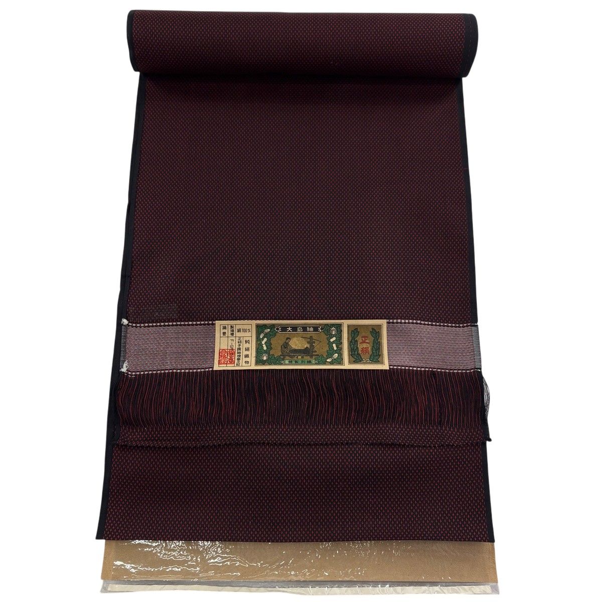 反物 秀品 紬 証紙有 幾何学模様 赤黒 正絹 【中古】