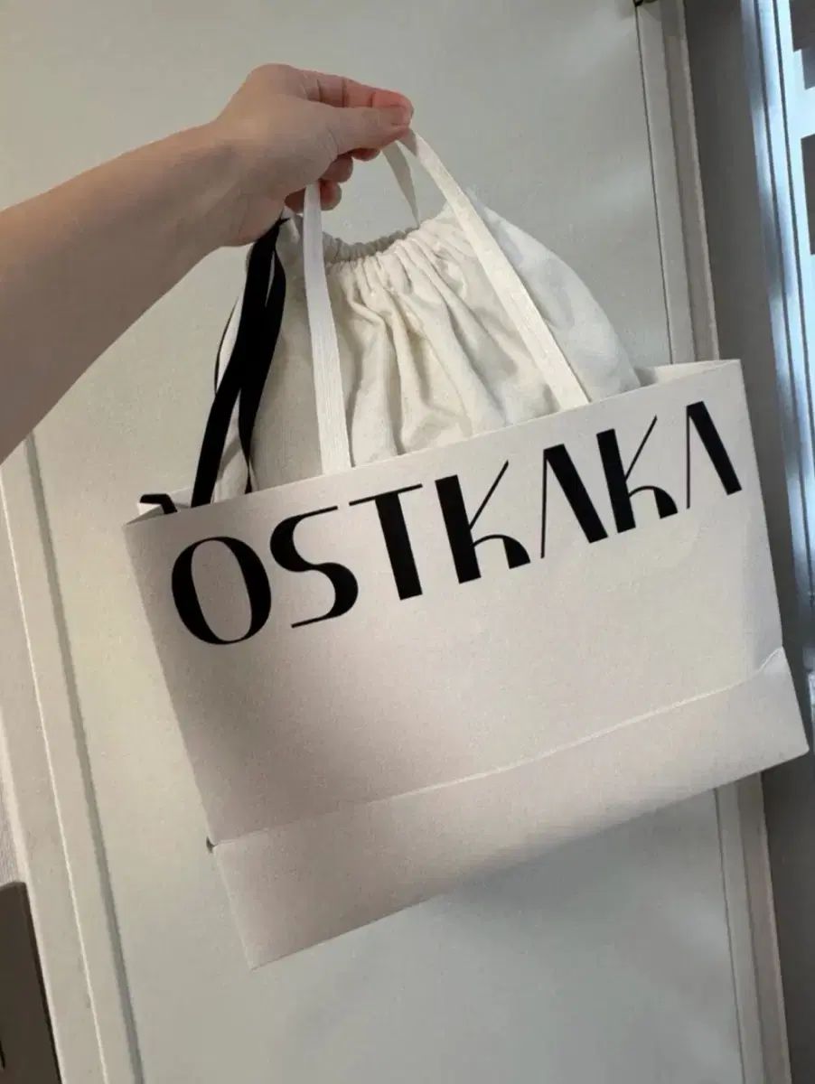 新品) オストカーカ ベルト バケットバッグ アイボリー トートバッグ クロスバック