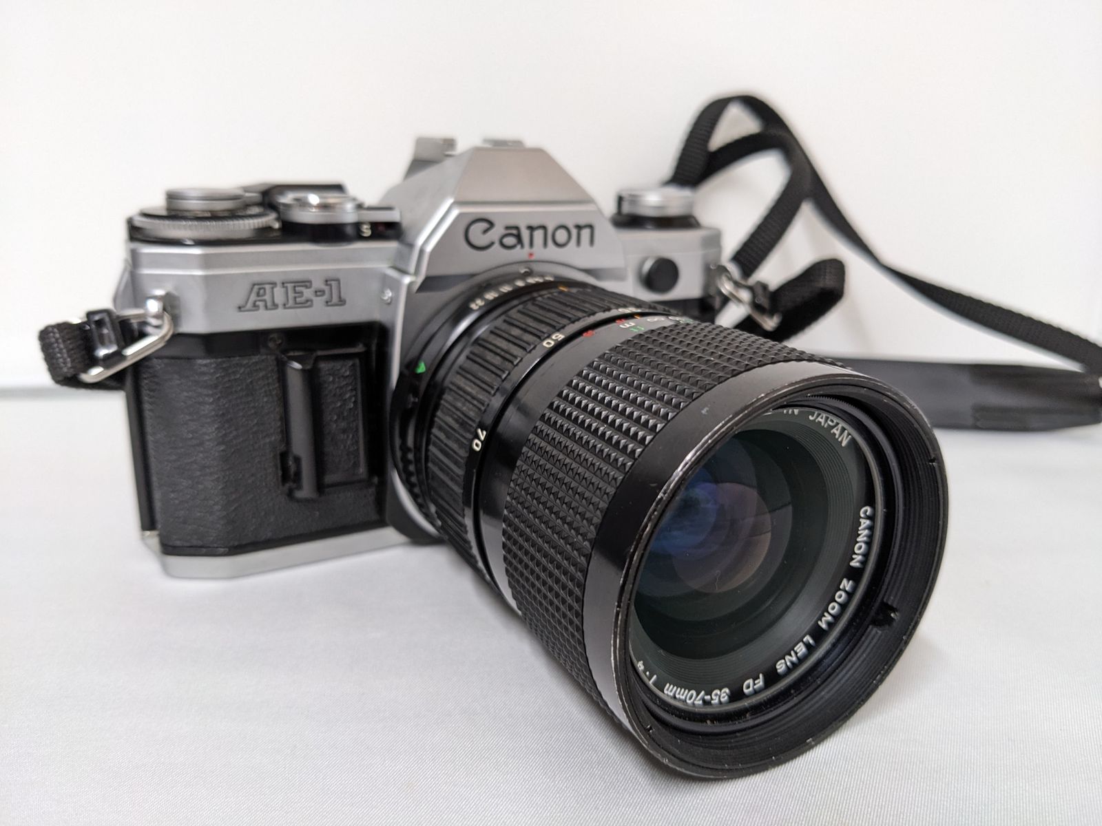 ジャンク◇Canon AE-1 フィルムカメラ一眼レフ レンズ 35-70㎜ - メルカリ
