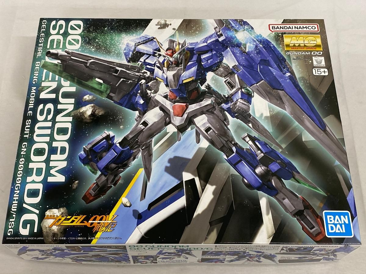 【未開封】MG 機動戦士ガンダム00V戦記 ダブルオーガンダムセブンソード/G 1/100スケール 色分け済みプラモデル