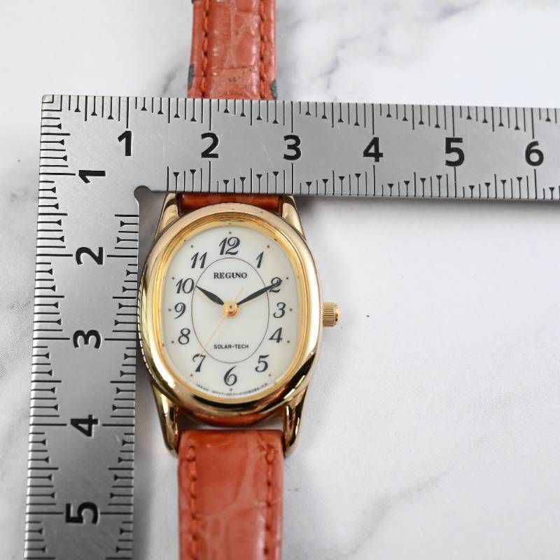 CITIZEN シチズン REGUNO レグノ ソーラー腕時計 レディース オーバルケース ゴールド×レザーベルト きれいめ 上質 大人カジュアル 動作確認済み