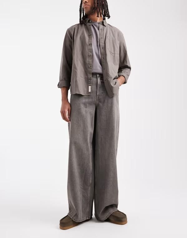 コルージョン メンズ ボトムス デニムパンツ ワイドレッグ ジーンズ COLLUSION wide leg mid rise jeans in washed Washed gray グレー