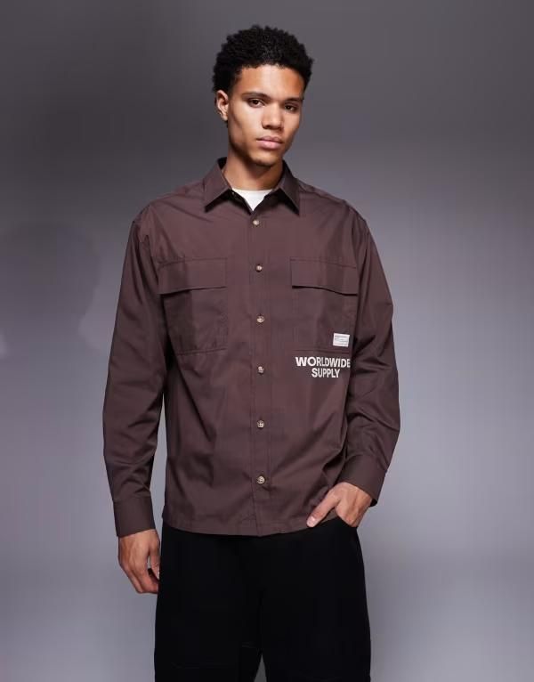 エイソス メンズ トップス シャツ プリント ASOS DESIGN oversized shirt with front print and patch in dark brown ブラウン
