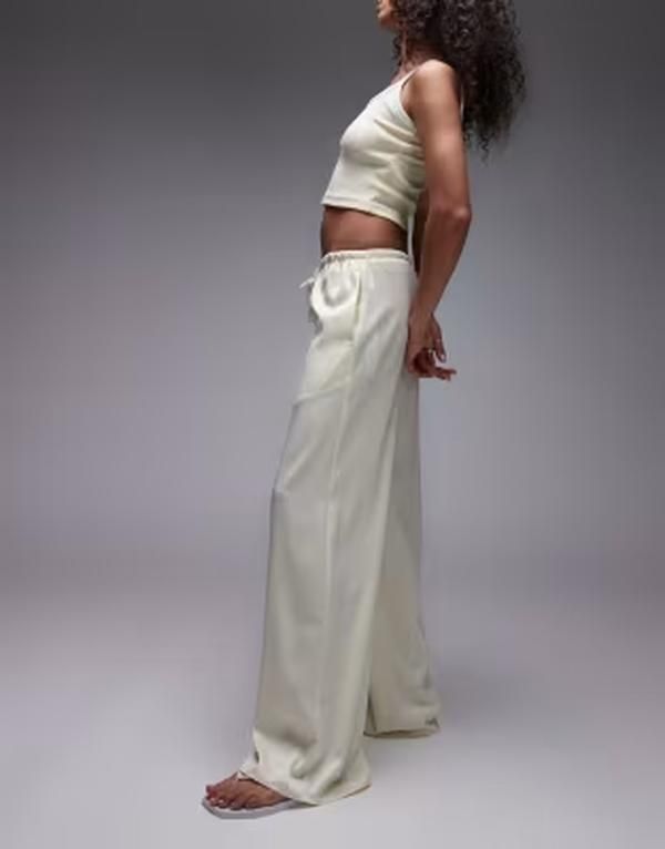 トップショップ レディース ボトムス カジュアルパンツ ワイドレッグ サテン Topshop satin tie waist wide leg pants in buttermilk