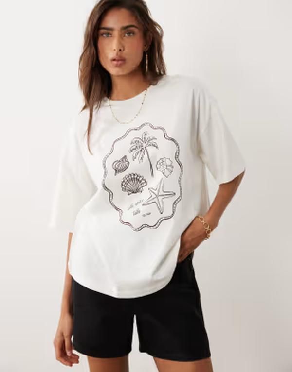 ザ・フロリック レディース トップス Tシャツ グラフィック The Frolic exclusive summer beach graphic front oversized Tshirt in c