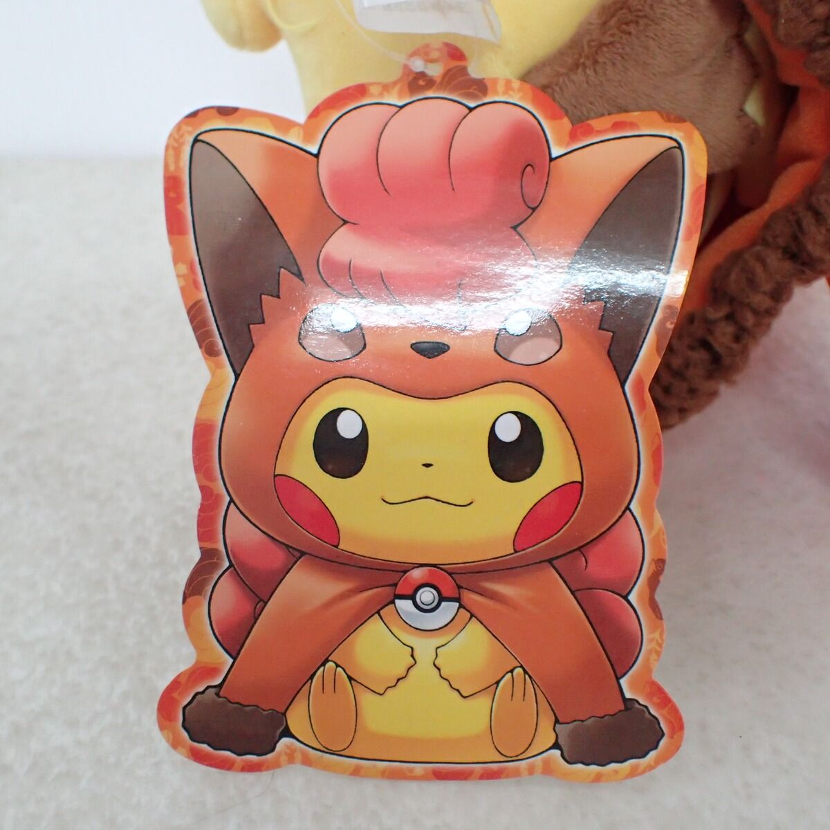 ポケモンセンター ぬいぐるみ ロコンポンチョのピカチュウ 紙タグ付き