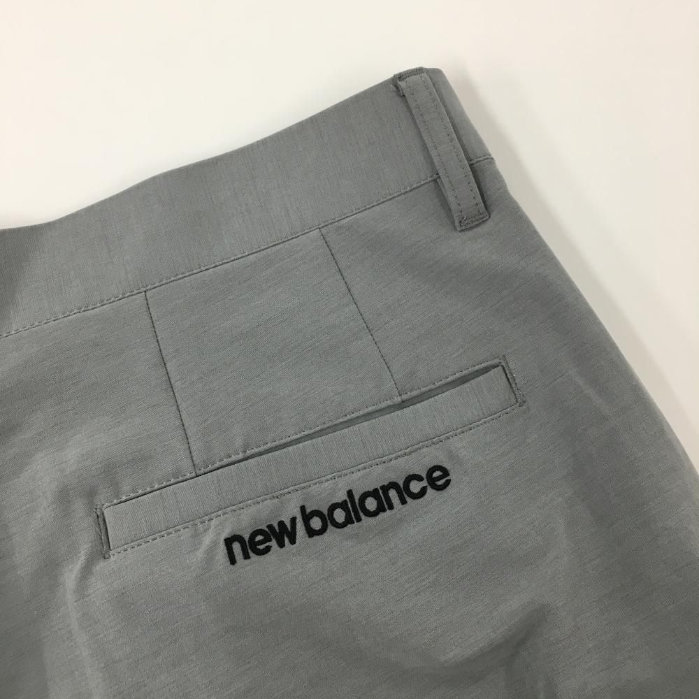 値下げ‼️New Balance ゴルフ　グレー ジャケット パンツセット 超美品】ニューバランスゴルフ パンツ 杢グレー×黒 後ろロゴ刺しゅう