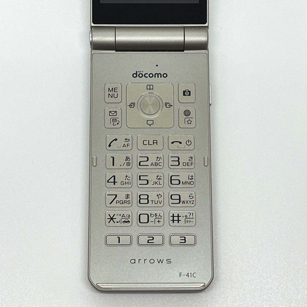 arrows ケータイ F-41C docomo SIM解除済 ゴールド 中古 - メルカリ