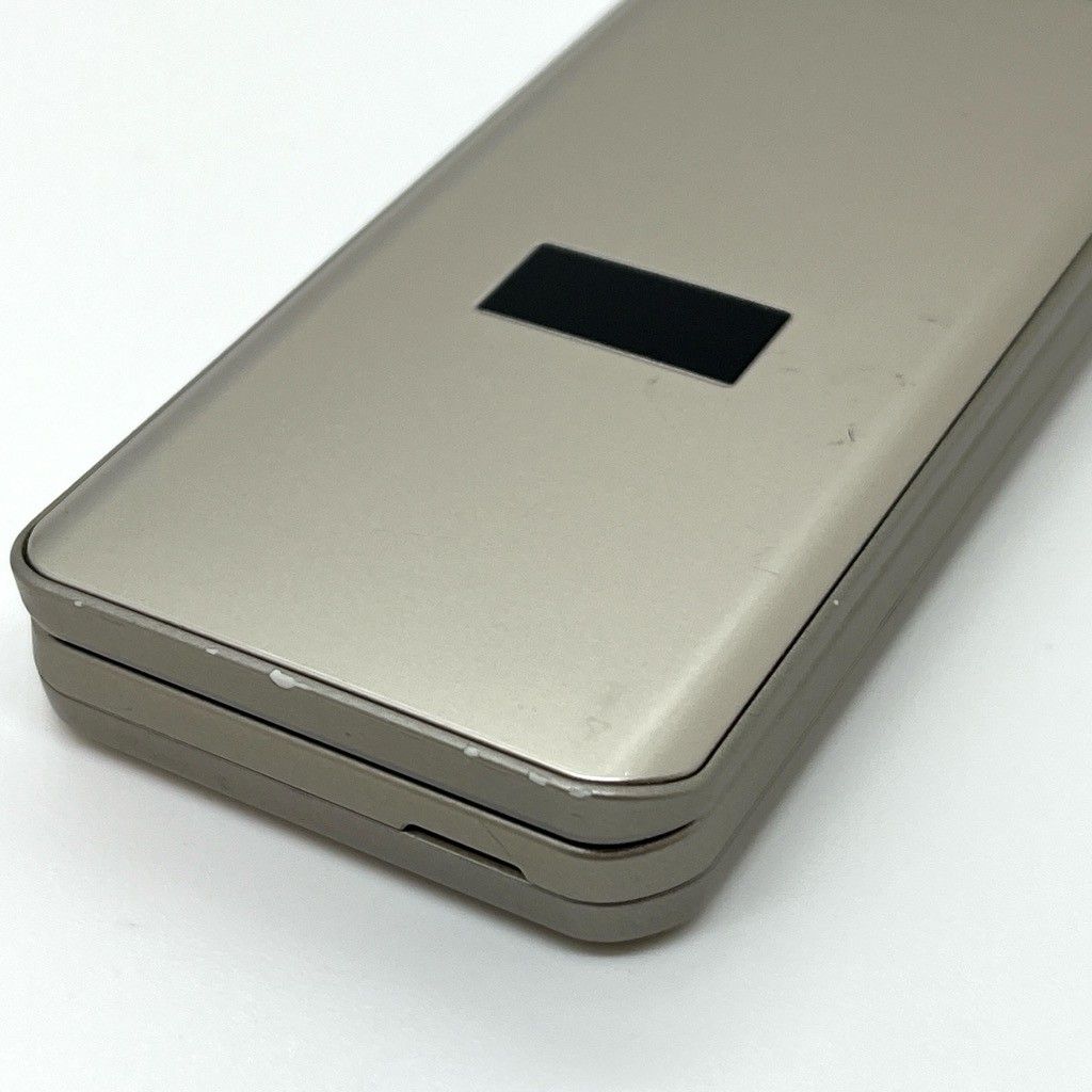 arrows ケータイ F-41C docomo SIM解除済 ゴールド 中古 - メルカリ