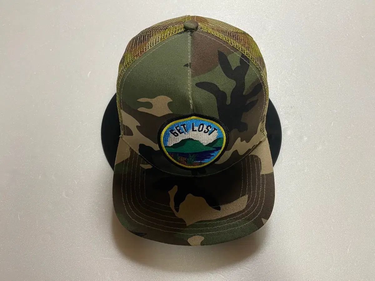 Reason camo vintage trucker cap