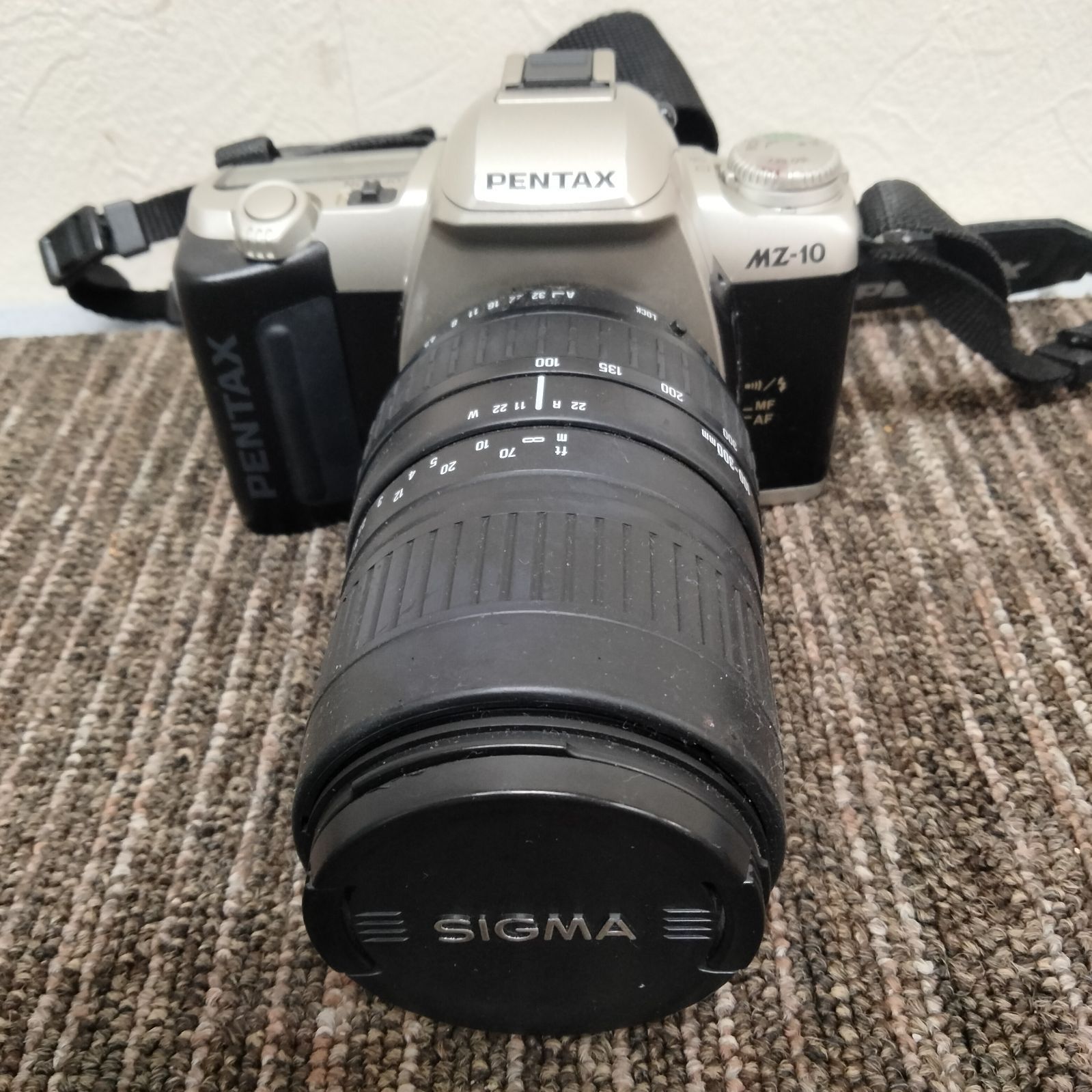 N-7336] カメラ(ジャンク品)PENTAX MZ10 レンズ SIGMA ZOOM 100-300mm