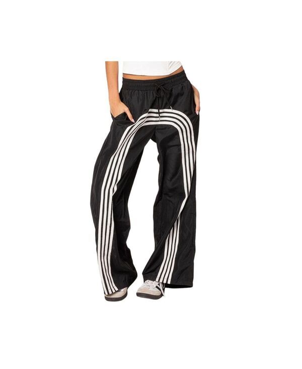 アディクテッド レディース ボトムス カジュアルパンツ トラックパンツ ナイロン パンツ Edikted Womens Wilda striped nylon track pants Blackand