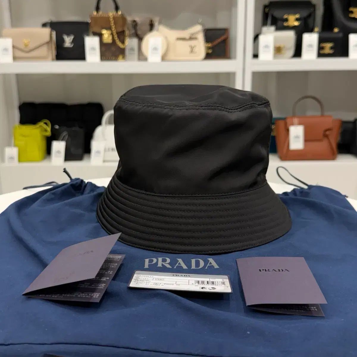 S PRADA プラダ リナイロン 三角ロゴ バケットハット - メルカリ