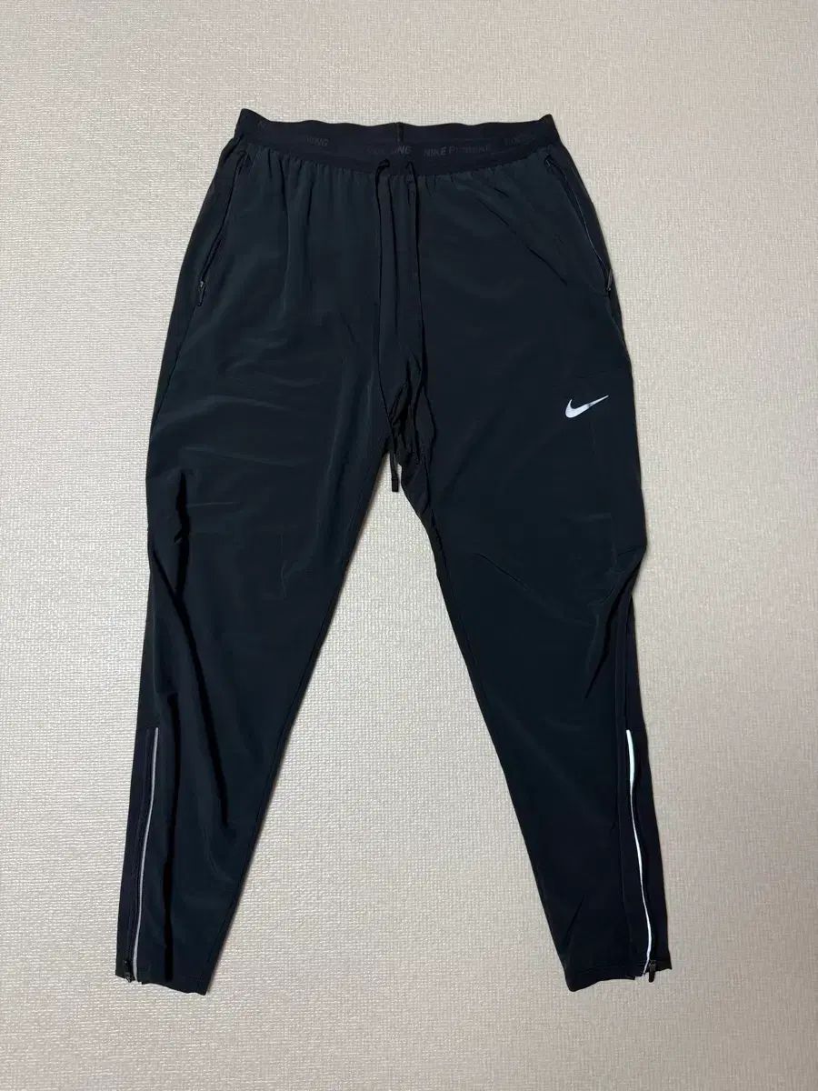 M NIKE（ナイキ） ドライフィット フェノム エリート ウーブン ランニング パンツ