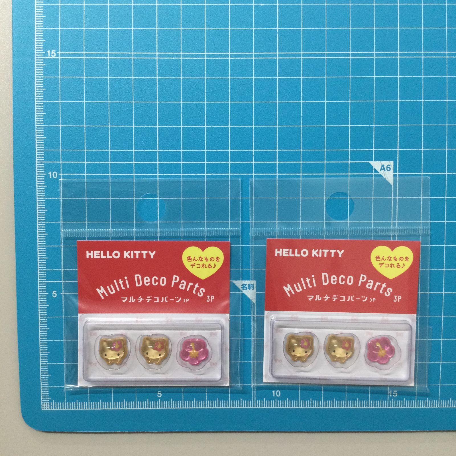 SAN612-0051【新品・未使用】ハローキティ マルチデコパーツ3P 日焼け 