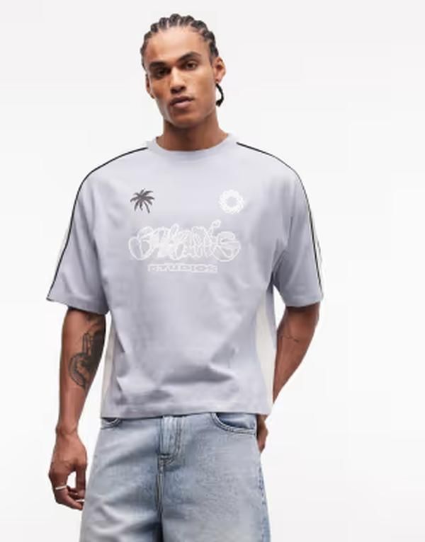エイソス メンズ トップス Tシャツ グラフィック ASOS DESIGN boxy oversized tshirt with soccer graphic in light BLUE BLIZZA
