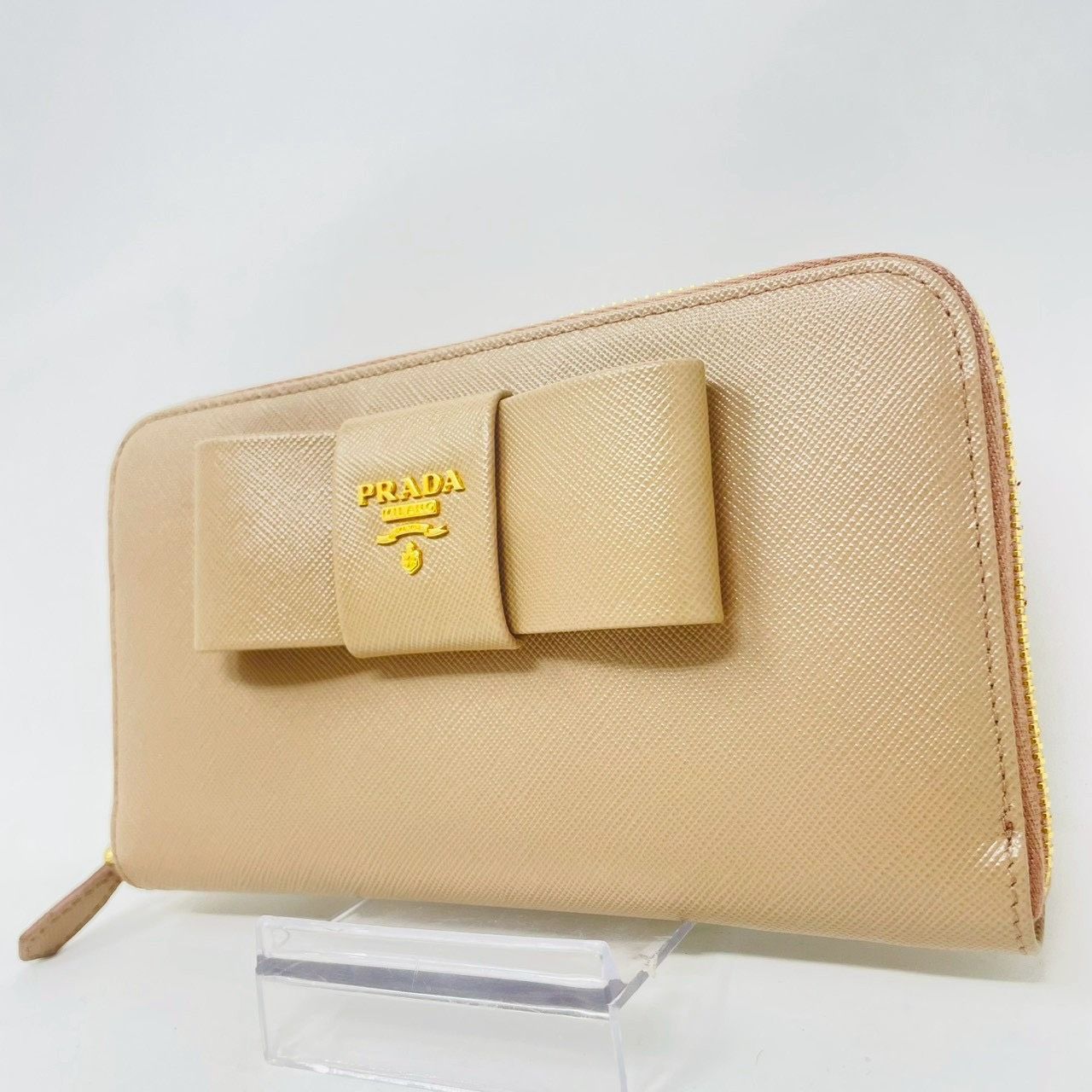 PRADA サフィアーノラウンドリボン付き長財布 ベージュ系 ❗️✨人気リボンデザイン✨❗️】PRADA サフィアーノ ラウンド