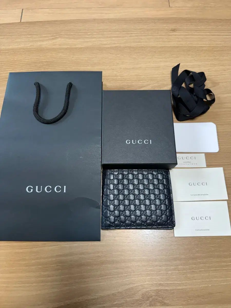 グッチ マイクロ GG シマ 二つ折り財布